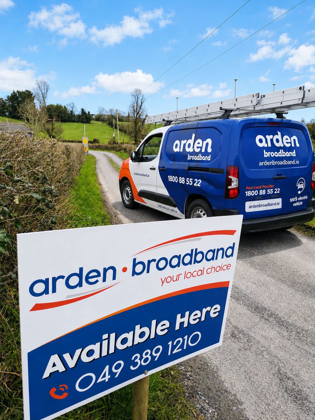 Arden Broadband van beside an 'Available Here' sign on a rural road